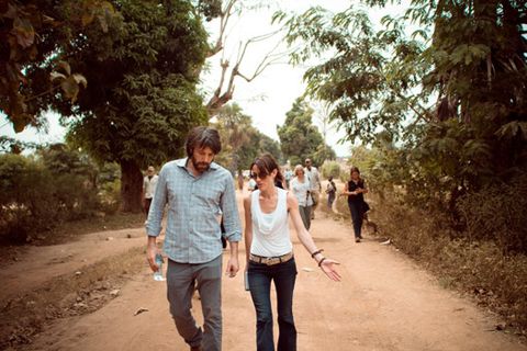 Ben Affleck and Whitney Williams walk down a clay road in the DRC in 2010.